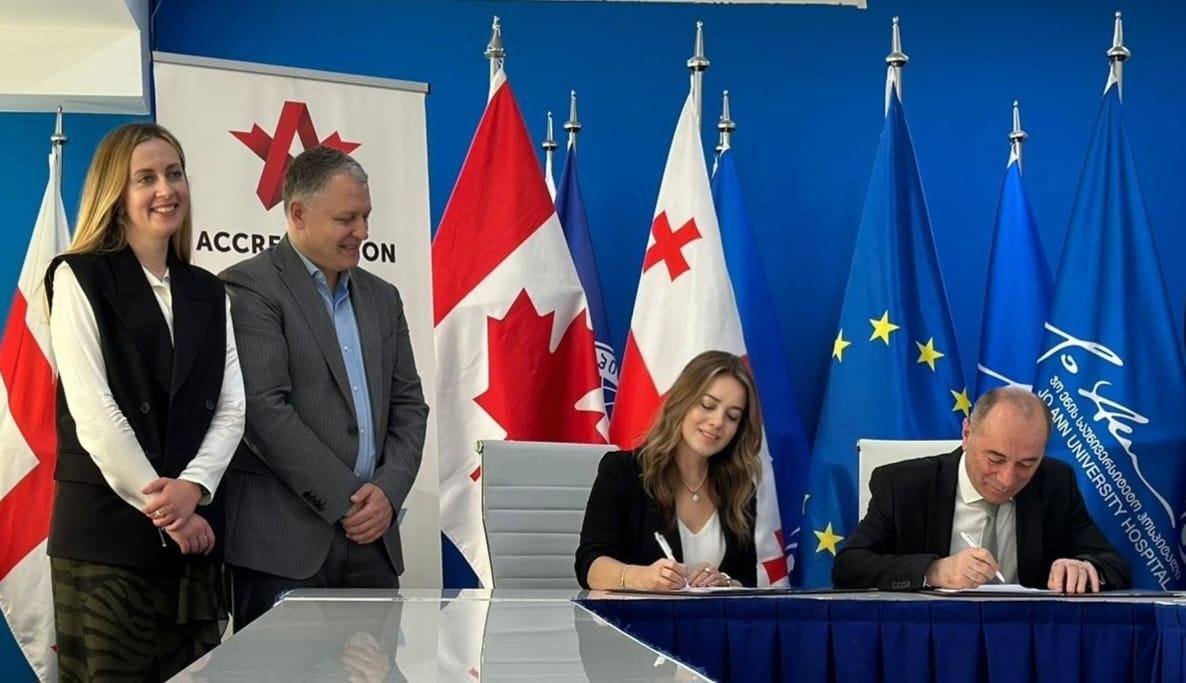 ხელშეკრულების ხელმოწერა, ჯო ენის საუნივერსიტეტო ჰოსპიტალი